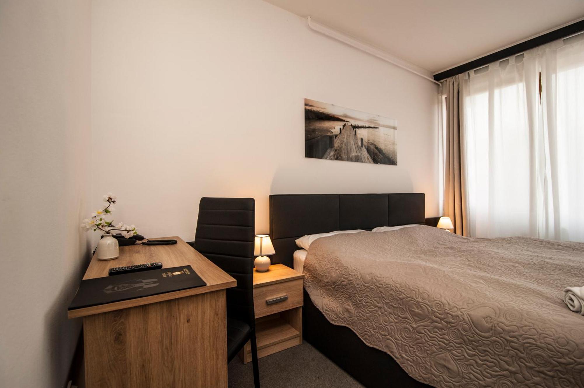 Hotel Faraon Celje Quarto foto